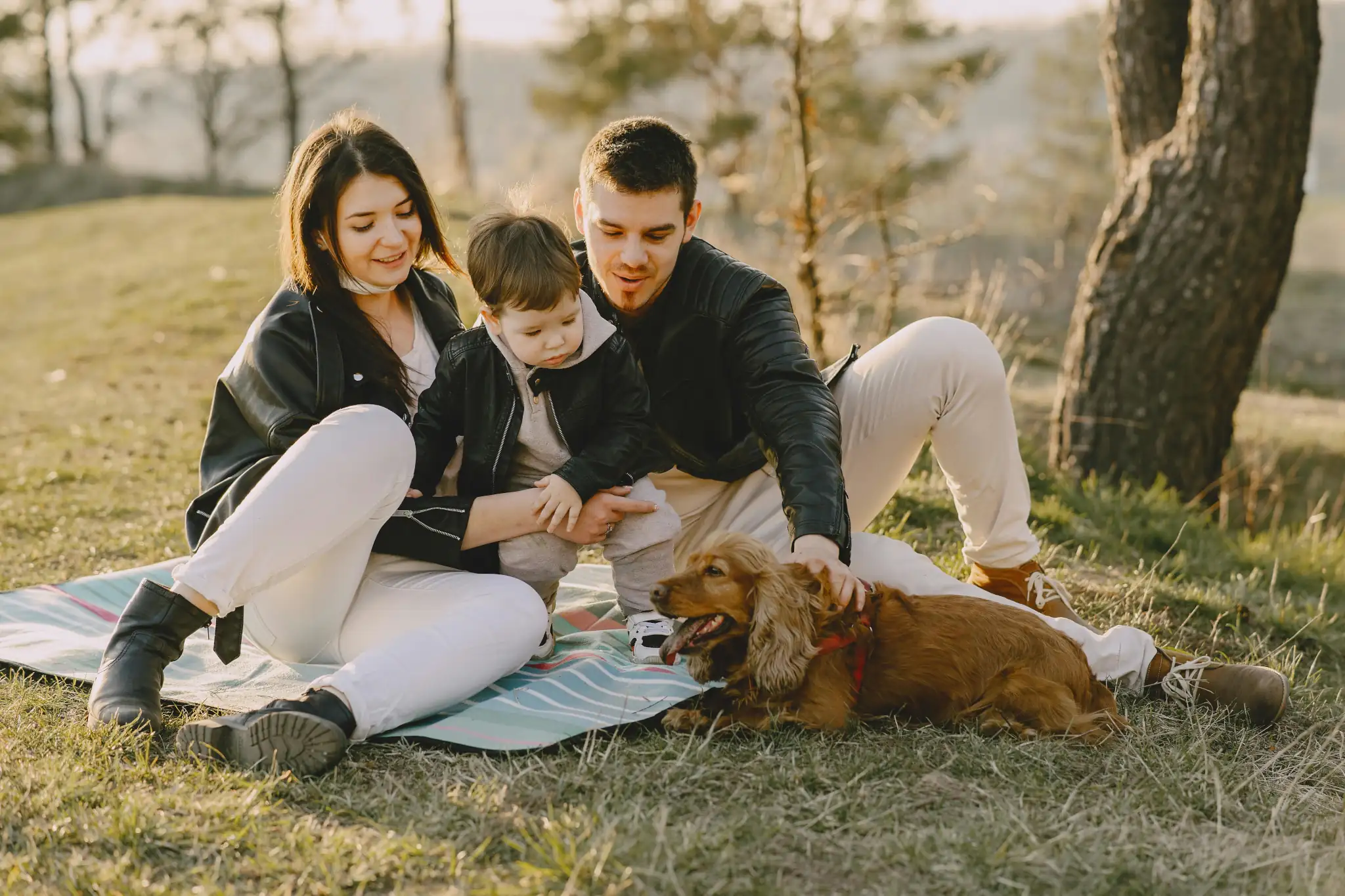 Family with dog in woodland